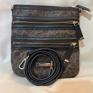 Calvin Klein Monogram Crossbody Bag in Black and Brown